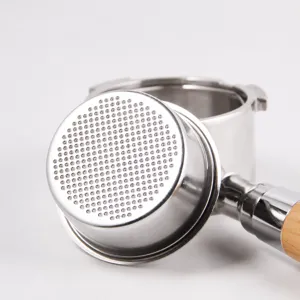 Stainless steel coffee bottomless portafilter with wooden handle for espresso machine.