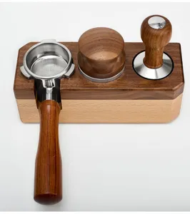 Wooden coffee tamper station holder with portafilter, distributor and espresso tool set.