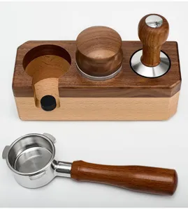 Coffee tamper station detail view showing solid wood base, portafilter, and distributor.