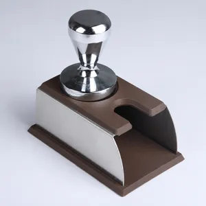 Set pressino per caffè in acciaio inossidabile e stazione di pressatura in silicone per barista.