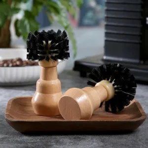 Espressomaschinen Brühgruppen Reinigungsbürste mit Holzgriff und schwarzen harten Borsten.