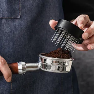 Coffee needle distributor detail shot, stainless steel WDT tool for espresso prep, clumps breaker.