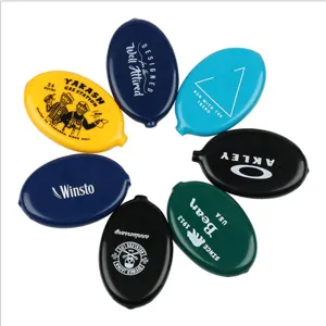 Colorful oval PVC squeeze coin purse, 80x50mm flexible rubber storage bag for portable use.