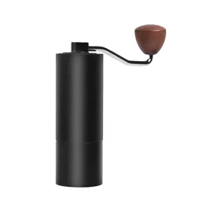 Manual hand crank coffee grinder with burr and wooden handle for home kitchen use