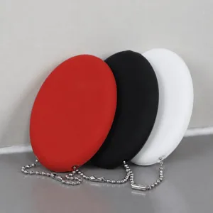 Pochette de rangement pour écouteurs en silicone portable avec chaîne porte-clés.