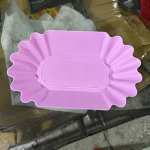 Vassoio in silicone per chicchi di caffè rosa a forma di barca per esposizione e raffreddamento.