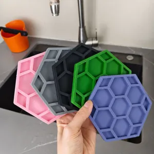 Multicolor hexagonal silicone coaster and heat insulation pad set, eco-friendly kitchenware.