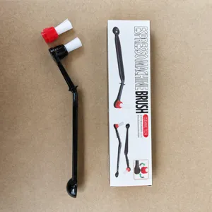 Espresso machine cleaning brush with long handle and replaceable brush head for easy daily care.