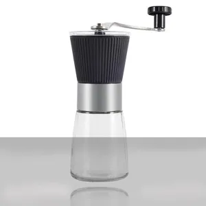 Macinacaffè manuale con contenitore di vetro e macina in ceramica per chicchi freschi.