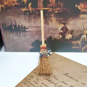 Mini witch broom car pendant with pentagram charm, perfect Halloween decoration ornament.