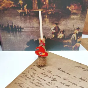 Mini witch broom pendant with red hat charm, perfect for Halloween and Christmas DIY decor.