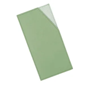 Detail shot of the light green PU leather cash envelope wallet with neat white stitching.