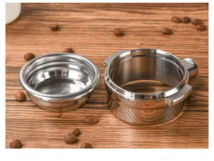 Stainless steel coffee portafilter and filter basket detail view, perfect for espresso brewing.