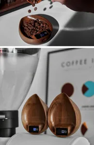 Detail view of walnut wood espresso coffee scale displaying precise bean weight.
