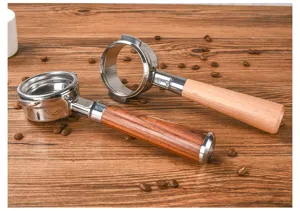 Stainless steel espresso coffee machine portafilter with wood handle detail view.