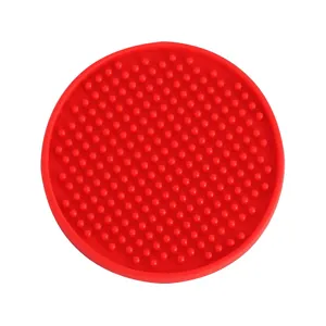 Detailed view of the red round silicone non-slip bar mat with textured dot surface for safety.