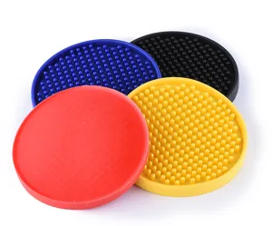 Silicone bar mat detail shot, non-slip rubber coaster close-up with raised pins for cups.