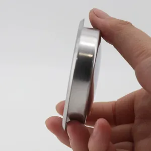 Stainless steel 58mm espresso machine backflush blind filter basket side profile detail view.