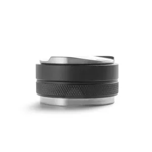 Adjustable coffee distributor and tamper with black body and stainless steel base for espresso prep.