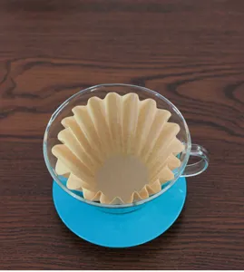 Bowl type coffee filter paper for hand drip brewing, natural brown wave paper cup detail.