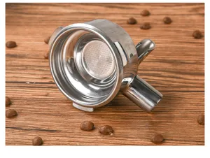 Close-up detail of stainless steel coffee machine portafilter spouted design with filter basket.