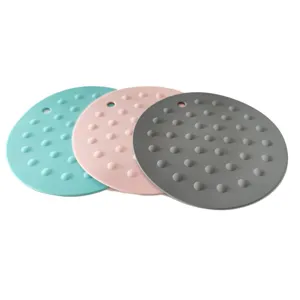 Ronde siliconen pannenlappen set met anti-slip noppen en ophanggat, hittebestendige onderzetter.