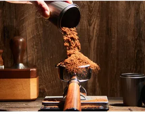 Stainless steel coffee dosing cup and portafilter funnel set for home espresso coffee making.
