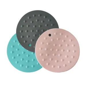 Gedetailleerd overzicht van de siliconen hittebestendige mat, ronde pannenlappen.