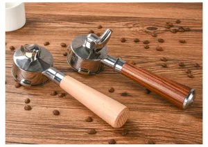 Stainless steel espresso coffee machine portafilter with solid wood handle, durable and professional.