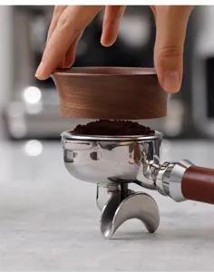 Walnut magnetic espresso dosing ring for portafilter coffee grinder powder funnel detail.