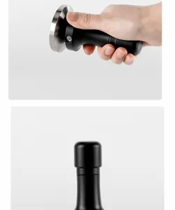 Pressino caffè in acciaio inossidabile con manico nero ergonomico per espresso