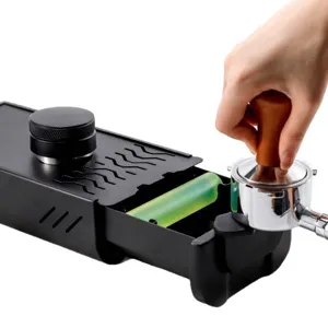 Cassetto battifondo per caffè professionale e stazione di pressatura espresso baristi.