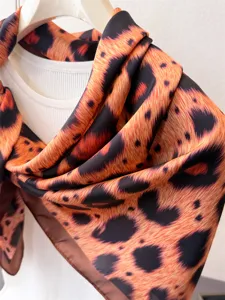 Detailed view of women elegant leopard print square scarf silk texture neck wrap accessory
