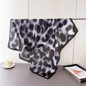 Elegant black and white leopard print square silk scarf for women, stylish neckerchief shawl.