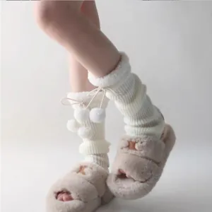 Cute Japanese lolita leg warmers with fuzzy pom-poms, soft knitted winter slouch socks.