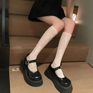 Japanese style white lace mid-calf socks paired with black platform Mary Jane shoes, summer thin.