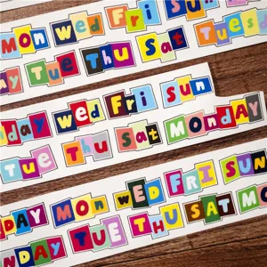 Decorative washi tape rolls featuring colorful ransom note style letters of the week.