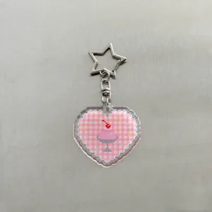 Pixel heart acrylic keychain detail, cute pink dessert pendant with star clasp and size spec.