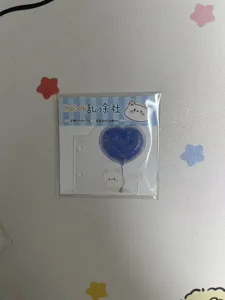 Closeup detail view of clear loose leaf binder divider page with cute cat and blue balloon illustration.