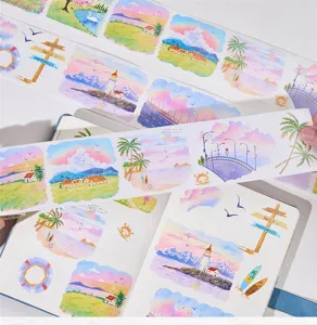 Decorative washi tape with watercolor landscape designs, die-cut pre-cut journaling stickers.