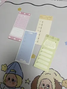 Cute memo pad detail shot displaying colorful planner sticky notes for daily planning.