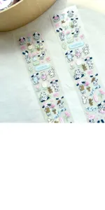 Cute spotty dog PET tape with floral and bow designs for journaling and crafting projects.