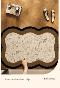 Detailed view of vintage floral absorbent bath mat with wavy edge and non-slip backing.