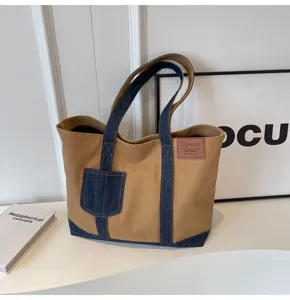 Γυναικεία τσάντα tote από καμβά και denim, μεγάλη χωρητικότητα και κομψή τσάντα καθημερινής χρήσης.