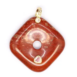 Square red stone pendant detail, gold-tone bail with sparkling zirconia and pink gem accent.