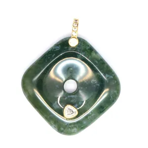 Detailed shot of square green natural stone pendant with gold-tone inlaid zirconia metal bale.