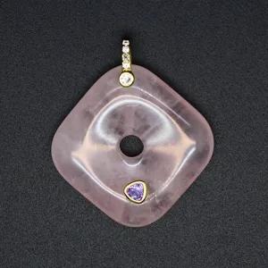 Rose quartz square peace buckle pendant detail view featuring gold bail and purple inlay stone.