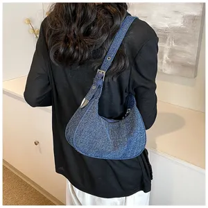 Detail view of the stylish denim hobo shoulder bag showcasing textured fabric and metal buckle.