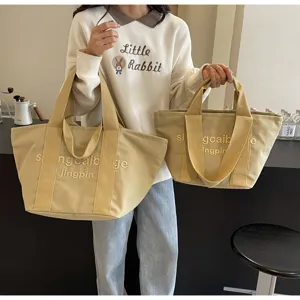 Grosse Kapazitaet Leinen Handtasche mit bestickten Buchstaben fuer modische Pendler.