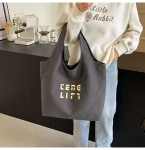 Große graue Canvas Umhängetasche für Damen, lässige Stofftasche für den täglichen Weg.